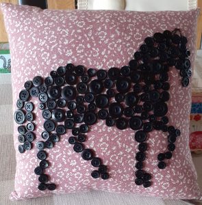 Lucy's-black-Button-Horse-cushion